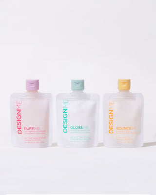 Front view of three pouches of DESIGNME conditioner bundle 60ml with different colors on the caps, indicating three different variants: BOUNCE.ME, GLOSS.ME & PUFF.ME