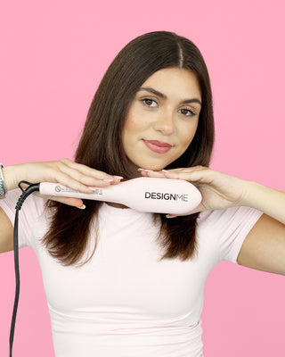 Model showing smooth, straight and frizz-free hair after using the smoothing brush