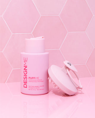 DESIGNME PUFF.ME volumizing shampoo with pink scalp brush on tiled background
