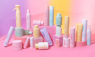 Photo of the complete DESIGNME Hair product collection, showcasing all lines and packaging together.
