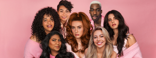 Seven distinct models featuring various hairstyles and textures against a pink background.