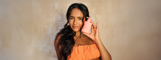 Cover photo of model holding HOLD.ME Styling Cream, showcasing the product front and center.