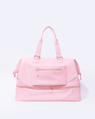 Back of Ally nicole travel beauty bag showcasing the hidden pocket.