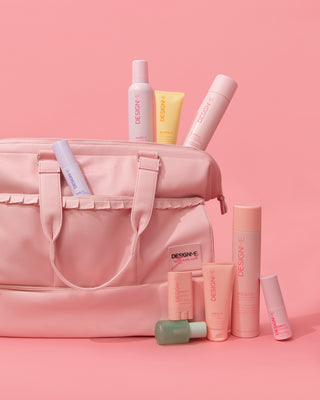 PUFF.ME volumizing mousse, PUFF.ME dry texture spray, PUFF.ME volumizing powder, HOLD.ME styling stick, HOLD.ME 3-way hairspray, HOLD.ME styling cream, BOUNCE.ME curl balm, GLOSS.ME hair oil FAB.ME leave-in sitting in the pockets of the Ally Nicole Travel Beauty Bag.