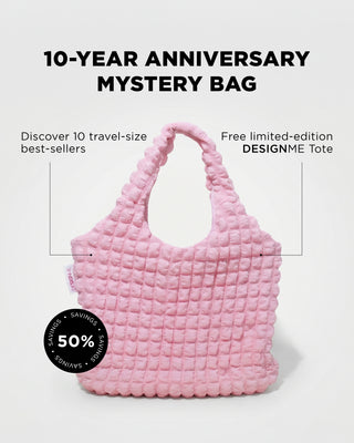 10-year anniversary mystery bag includes 10 travel-size best sellers and a free limited-edition DESIGNME tote bag with 50% savings