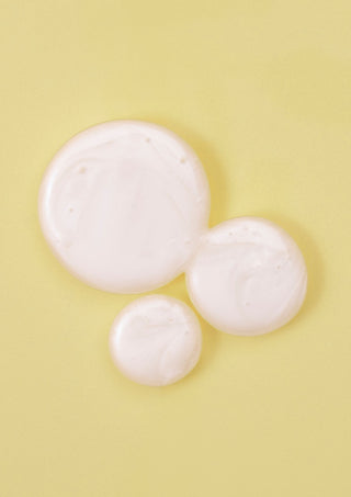 Close-up of BOUNCE.ME Curl Shampoo Discovery Size showing a rich creamy formula