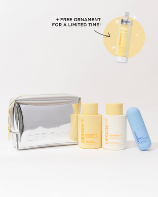 Curl-defining signature kit on a grey background with a bubble + free ornament for a limited time!