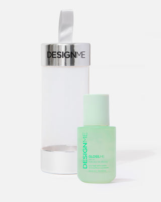 GLOSS.ME hair oil sits outside ornament packaging, displayed on a grey background.
