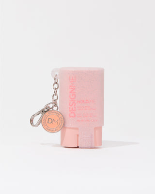 HOLD.ME styling stick glitter pouch on grey background.