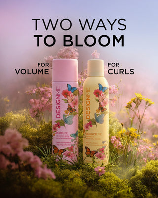 Our limited edition Women's Month BOUNCE.ME curl mousse and PUFF.ME dry texture spray sit side by side on a bed of greenery and flowers. Two ways to bloom: For volume and for curls.