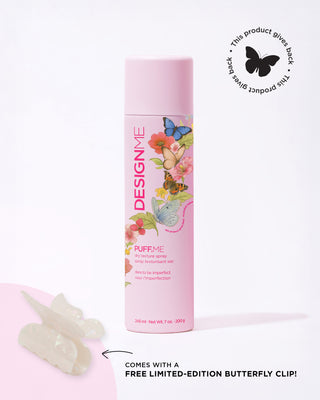 Limited-edition Women's Month PUFF.ME dry texture spray on a grey background. In the corner is a sticker that says 'This product gives back'. Comes with a free limited-edition butterfly clip.