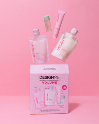 DESIGNME Volume Discovery Kit displayed with its hair care products.