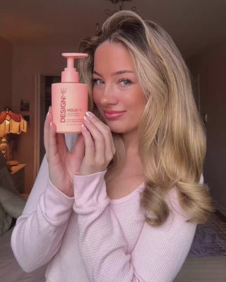 Sarah using HOLD.ME styling cream to create a frizz-free, bouncy blowout.