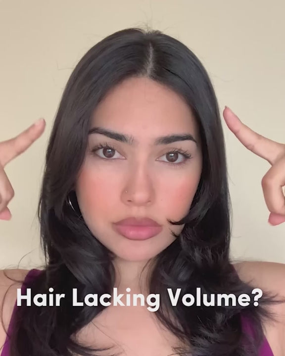 Video of a model applying PUFF.ME Volumizing Powder to one side of her roots, showing how to use it with a clear before and after of added volume.